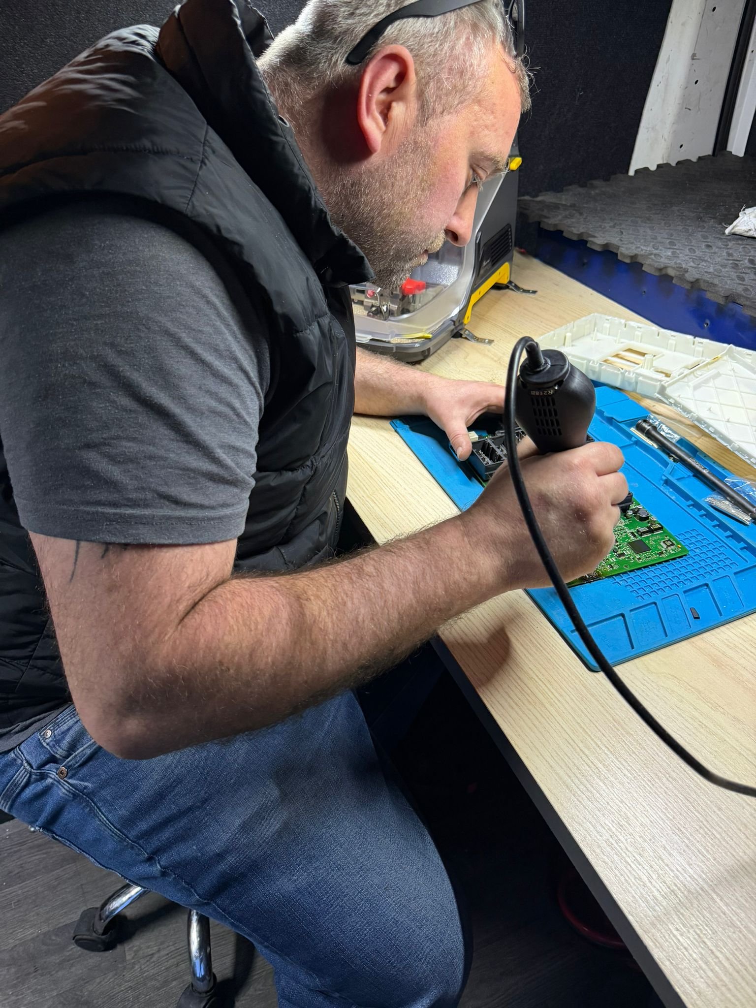 Lee Mccran programming a car key on-site in Manchester